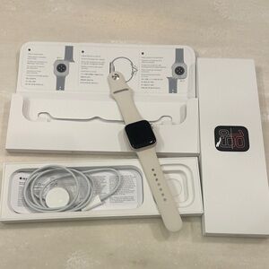 NEW Apple Smartwatch with Silver Frame and White Strap Brand new never set up
